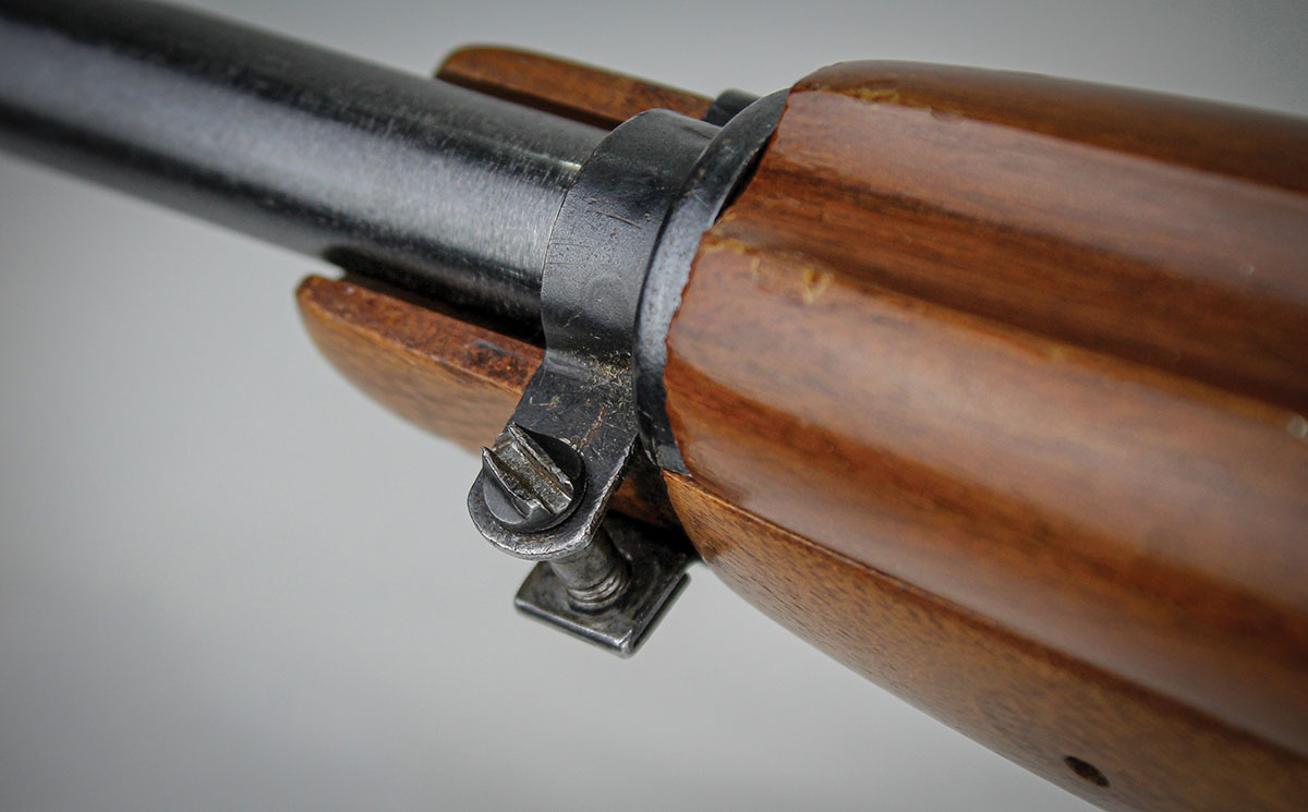 Barrel heating and changing tension on the barrel band screw affects bullet point of impact downrange.